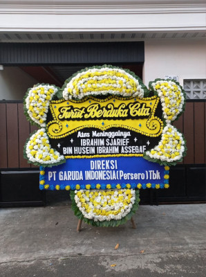 Papan Bunga Duka di Kampung Manggis
