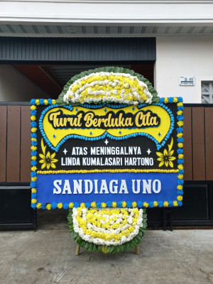 Papan Bunga Duka di Kampung Manggis